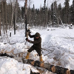 WeatherWool Advisor Jesse Manuta bucking logs by hand in 10F/-12C wearing WeatherWool in comfort