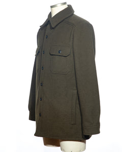 The WeatherWool ShirtJac is pure Merino Jacquard wool fabric, highly weather-resistant and versatile, with a substantial collar, center front secured by Slot Buttons, Handwarmer Pockets, two chest pockets secured by flaps and Slot Buttons.  Adjustable cuffs.  Large handwarmer pockets secured by zippers.